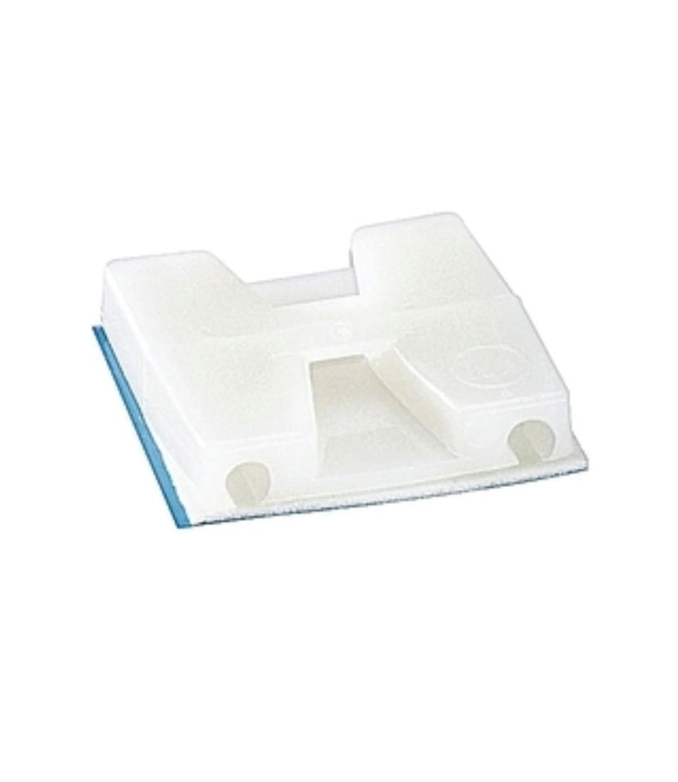 A white plastic piece of material sitting on top of a table.